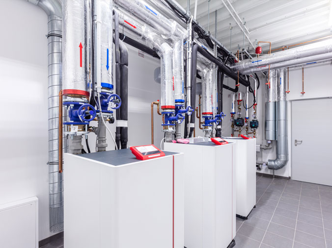 Hot water pumps in a commewrcial boiler pump room